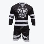 A black and white long-sleeved sports jersey with a skull warrior logo and matching shorts with stripes and the number 9.