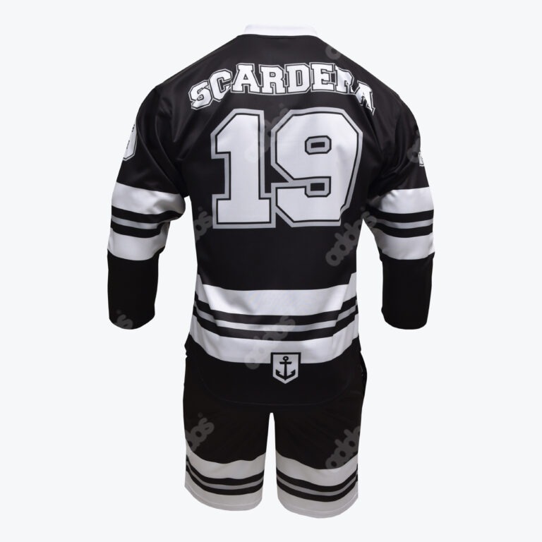 Back view of a black and white hockey jersey with the name SCARDERA and number 19, paired with matching striped shorts.
