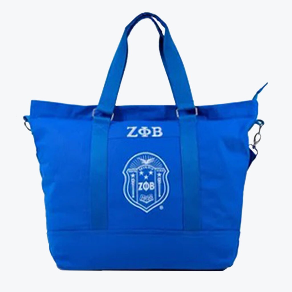 Royal blue tote bag with white Zeta Phi Beta Greek letters and shield emblem on the front.