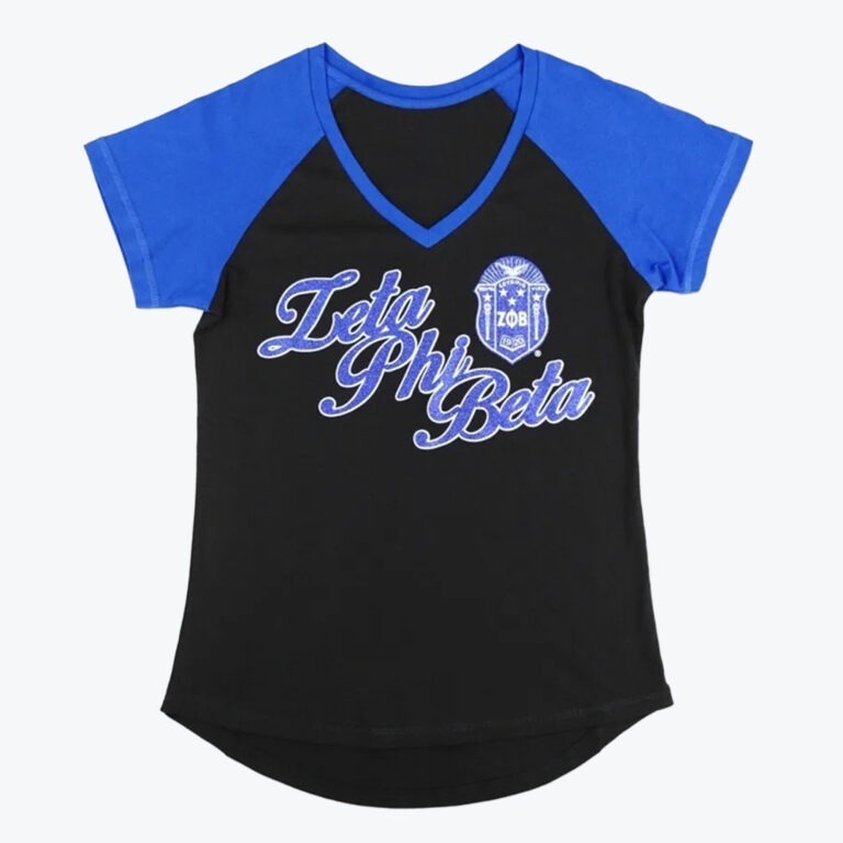 A black women's v-neck t-shirt with royal blue sleeves and collar, featuring Zeta Phi Beta in glittery blue script and the sorority's shield on the front.
