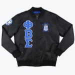 A black bomber jacket with blue and white Phi Beta Sigma Greek letters on the right chest and the fraternity crest on the left chest.