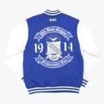 The back of a royal blue and white varsity jacket featuring a large white printed crest of Phi Beta Sigma Fraternity, Inc., with the founding year 1914 split on either side.
