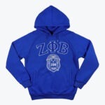A royal blue hoodie with the Greek letters ZΦB and the Zeta Phi Beta shield embroidered on the front in white.