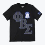 A black t-shirt featuring large grey Greek letters for Phi Beta Sigma outlined in blue, with a fraternity crest on the chest and the number 19 on the sleeve.