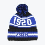 A black, blue, and white knit beanie with 1920 on the crown and ΖΦΒ embroidered on the cuff, topped with a pom-pom.