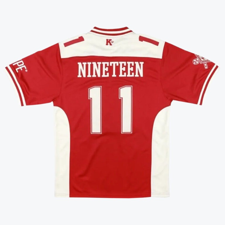 Back view of a red and white jersey with the name NINETEEN and number 11 printed in white.