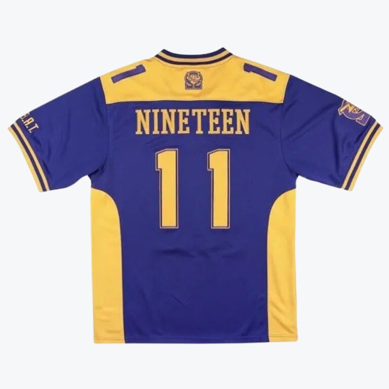 The back view of a purple sports jersey featuring contrasting yellow shoulder panels and sharp side stripes. The name NINETEEN is printed boldly across the upper back, positioned directly above the prominent number 11.