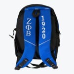 Back view of a black and blue backpack with ΖΦΒ and 1920 embroidered in white on the shoulder straps.