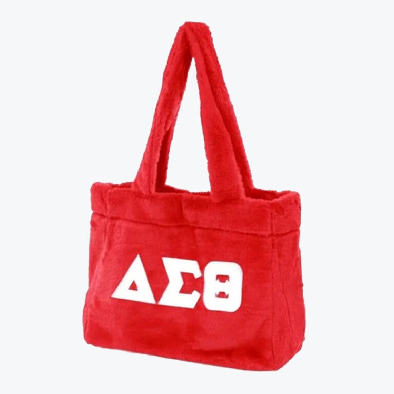 A red fuzzy tote bag with white Greek letters Delta, Sigma, and Theta on the front.