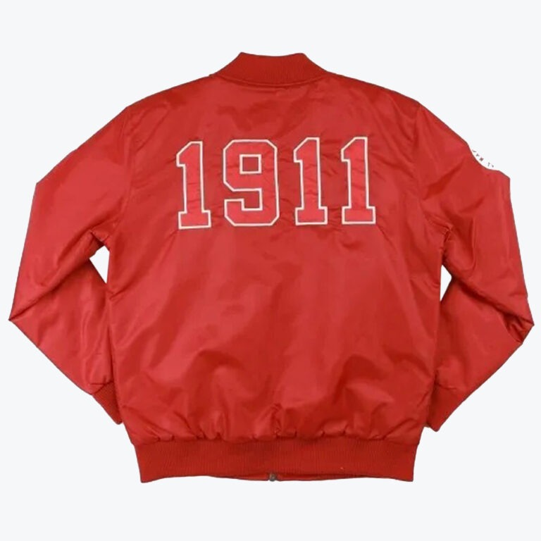 The back of a red bomber-style jacket featuring the year 1911 in large white-outlined numbers.
