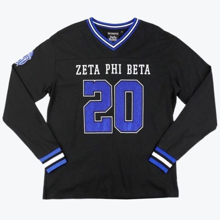 A black long sleeve jersey shirt with ZETA PHI BETA and the number 20 in blue on the front featuring a blue and white striped collar and cuffs.